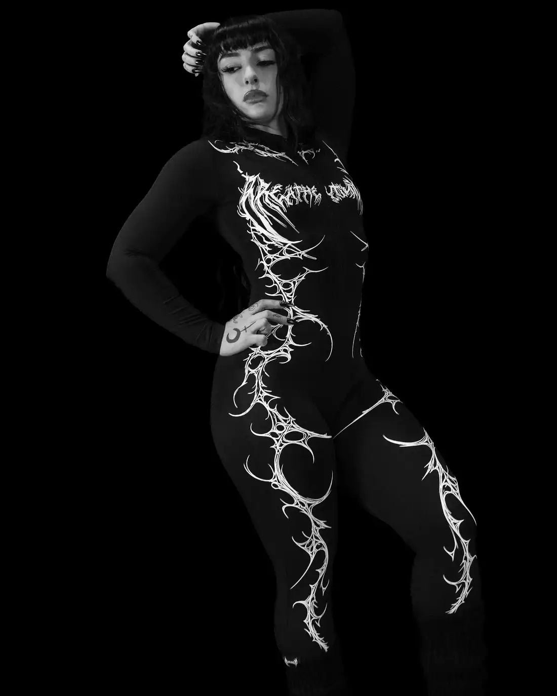 GOTICO ENTERIZO LEVANTA GLUTEOS - fitted butt-lifting yoga jumpsuit.